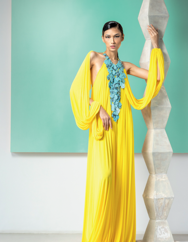 Canary yellow stretch tulle halter gown with faux turquoise beaded details, by JUN ESCARIO.