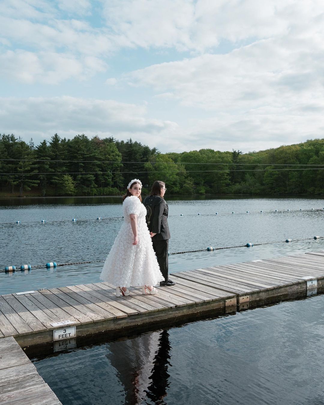 Beanie Feldstein and Bonnie-Chance Roberts by the lake.