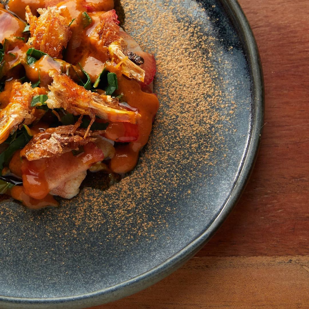 "Half" steamed Balesin shrimp, tamarillo and fermented strawberry dressing, crispy sweet heads, cured shrimp "seasoning," unripe benguet strawberries