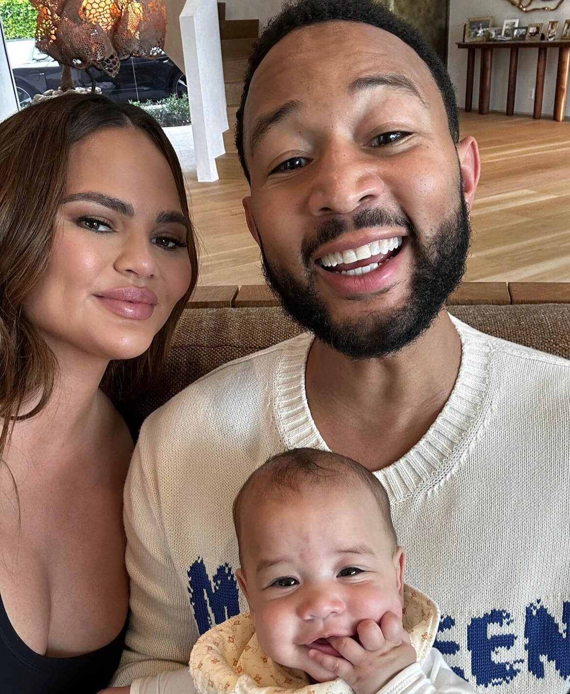 Chrissy Teigen and John Legend with their daughter Esti
