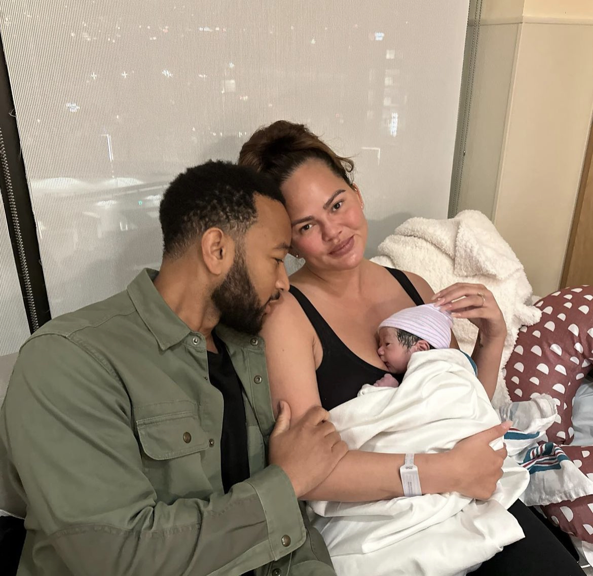 Chrissy Teigen and John Legend with baby wren