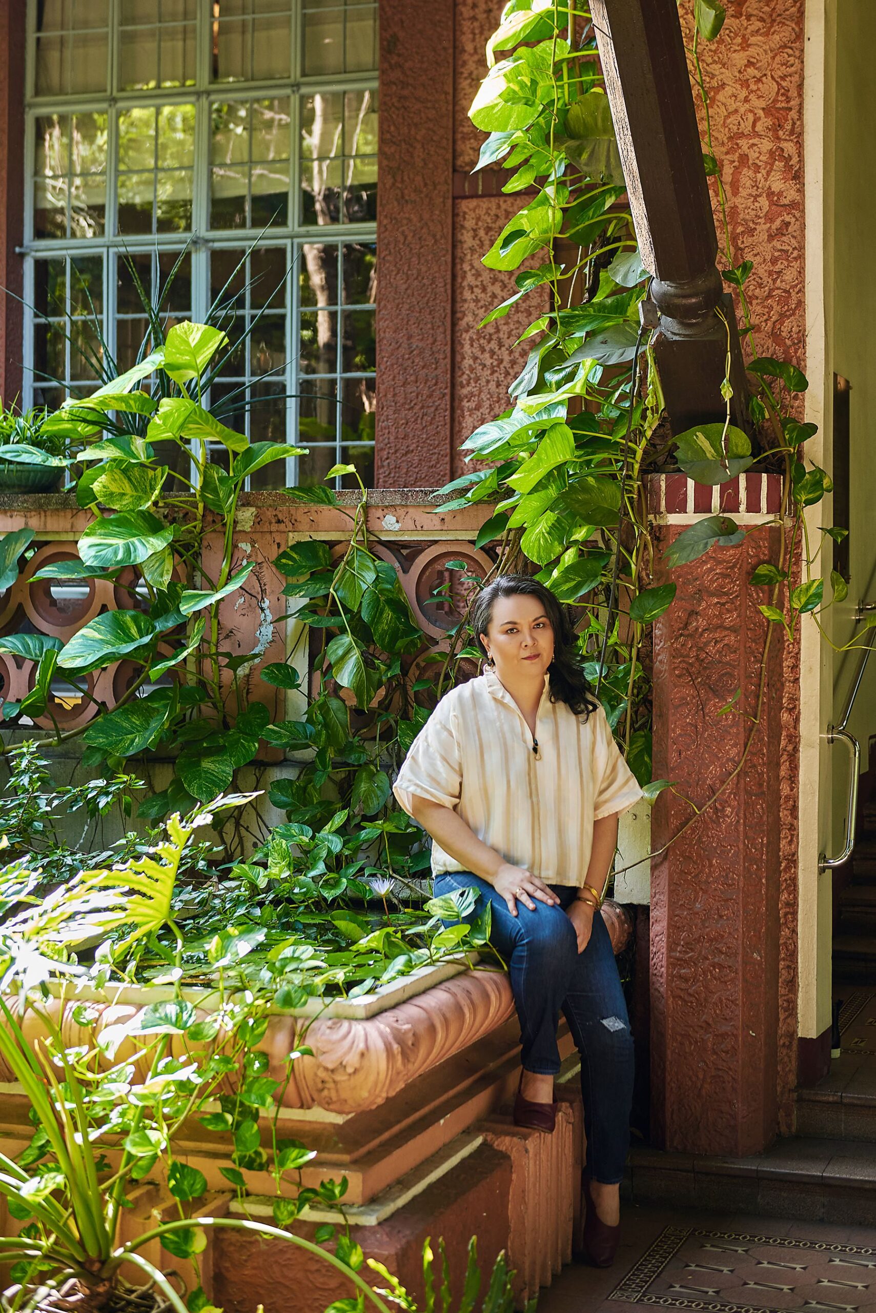 Head to toe in her Filipino-crafted ensemble: Tepiña Renee top, Renegade Folk flats, and Natalya Lagdameo jewelry