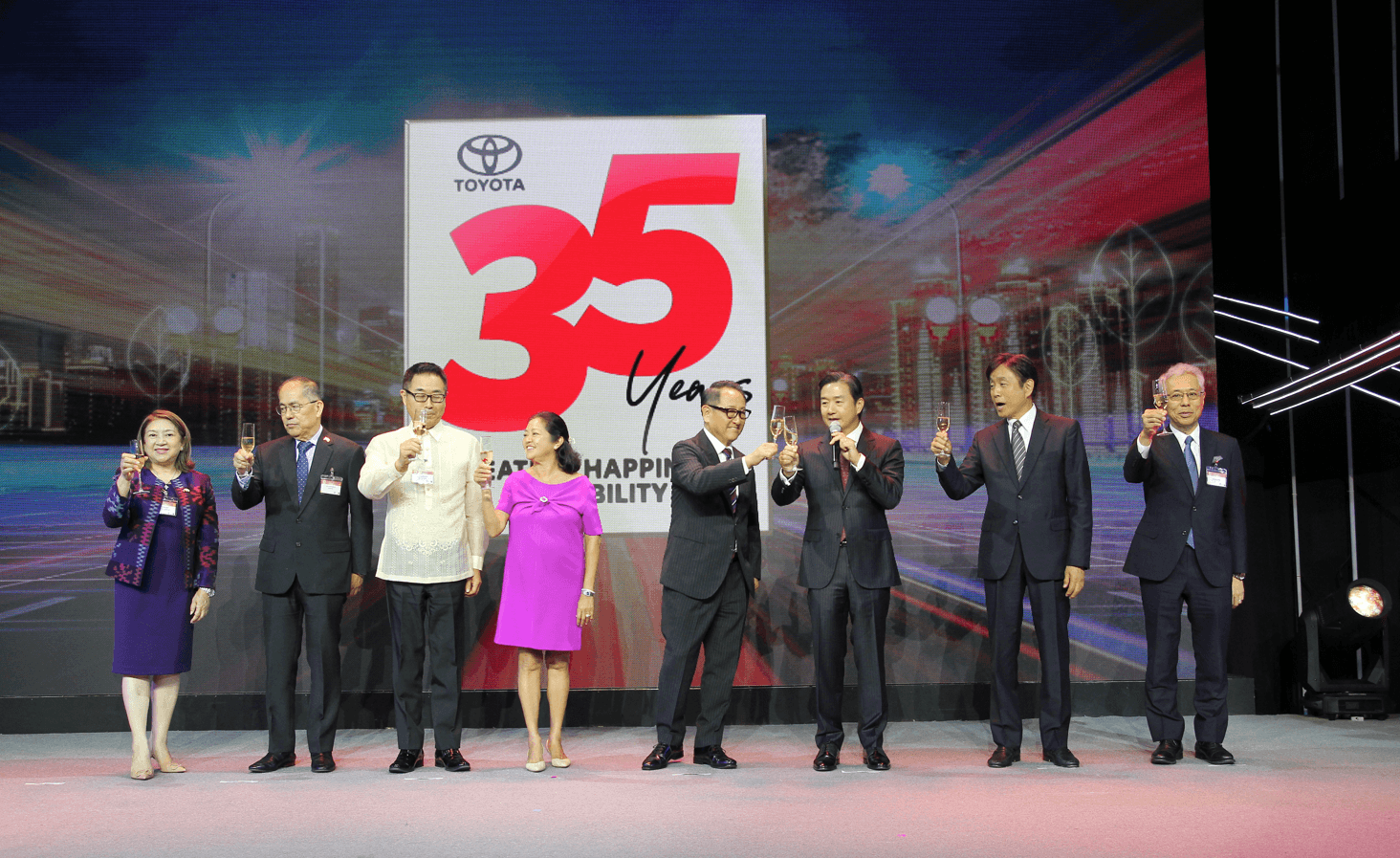 First Lady Liza Araneta-Marcos makes a toast with TMP and TMC executives at the Grand Hyatt