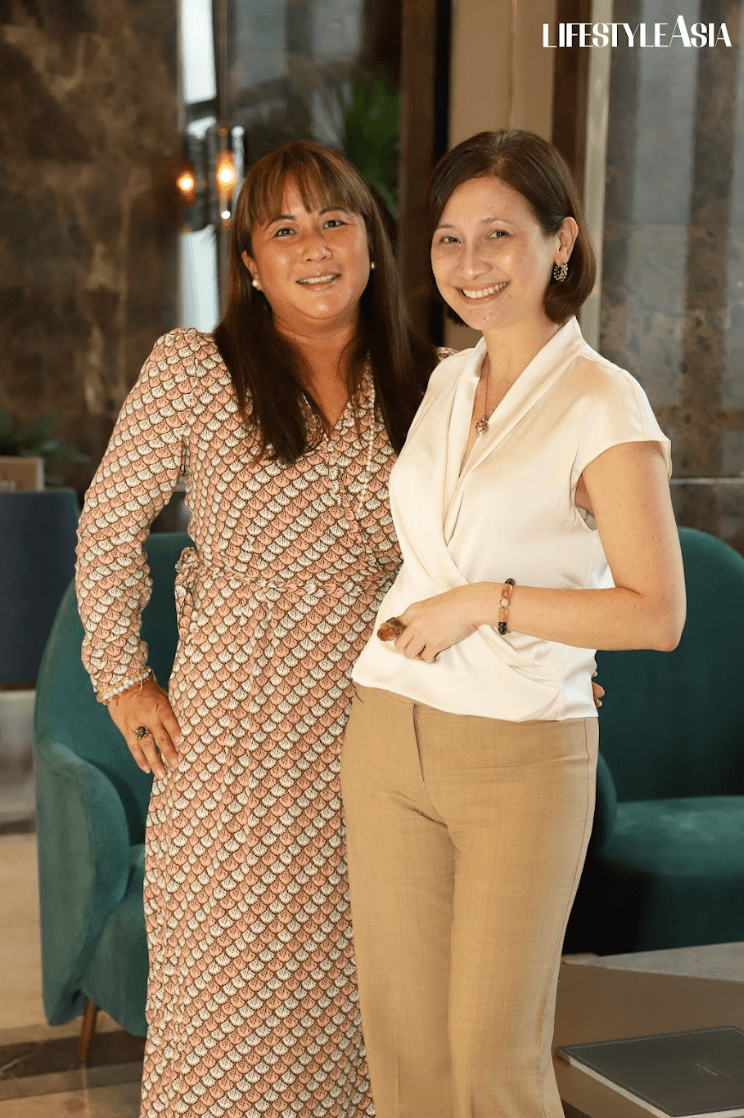Francesca Warnke with Lifestyle Asia Digital & Managing Editor Mawi de Ocampo smiling at the camera.
