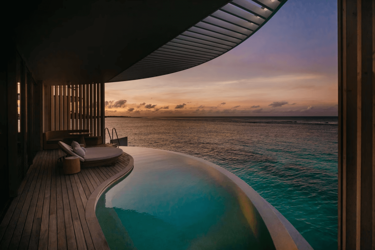 A private pool and a sunset beach view from one of the Ritz-Carlton's villas