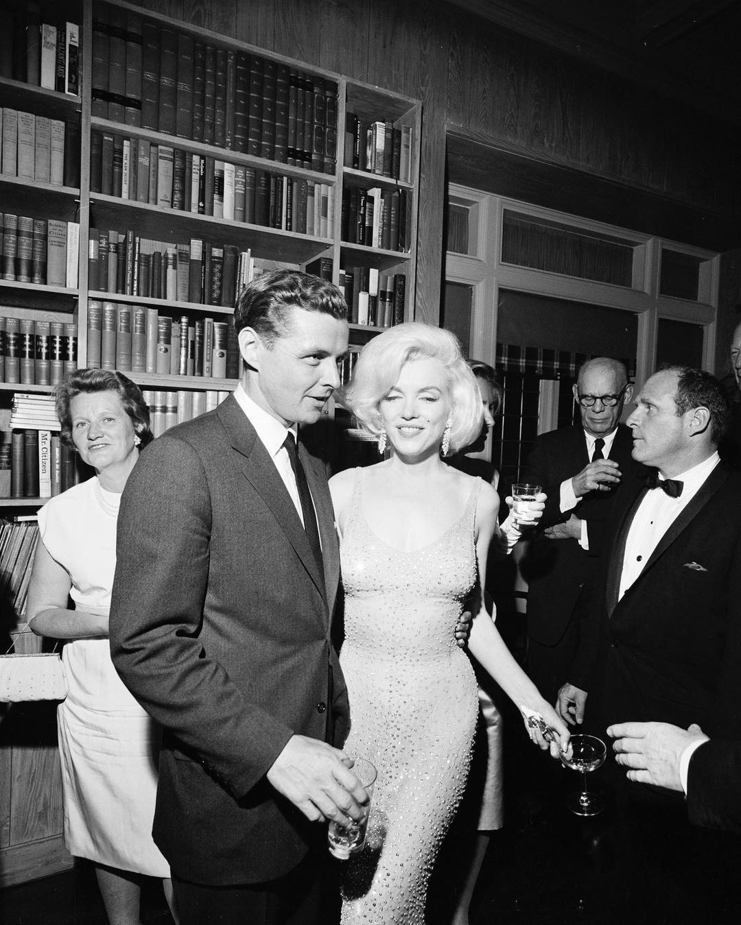 Marilyn Monroe wearing the dress in the company of John F. Kennedy