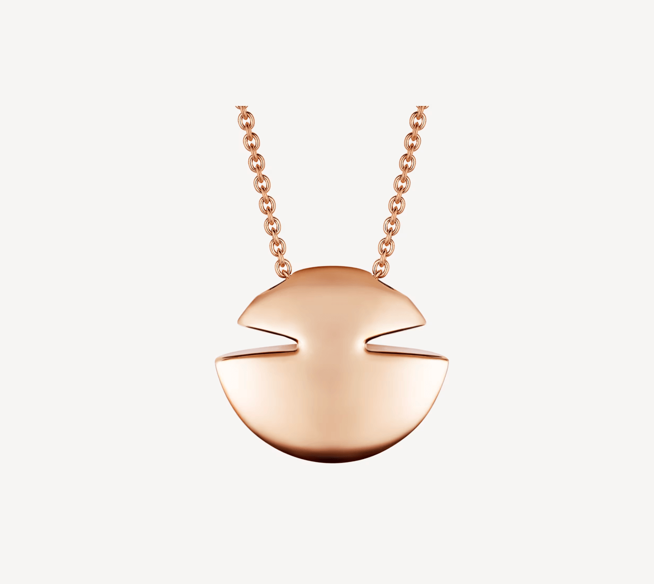 Enter the realm of love and good fortune with this delicate 18-karat rose gold necklace from Bulgari. It's a talisman that adds subtle charm to any collection. 