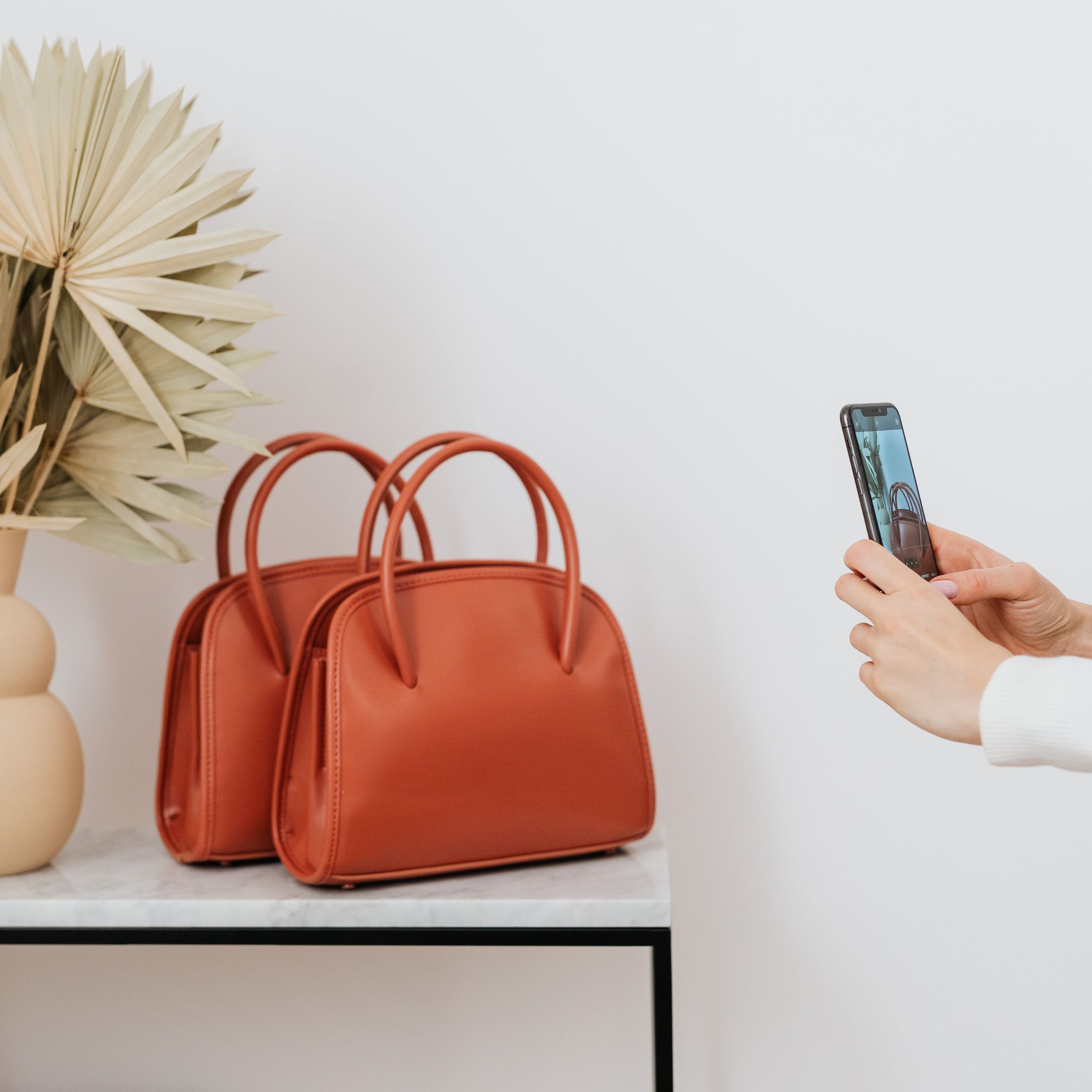 Millennials and Gen Z's new hobby is reselling luxury handbags