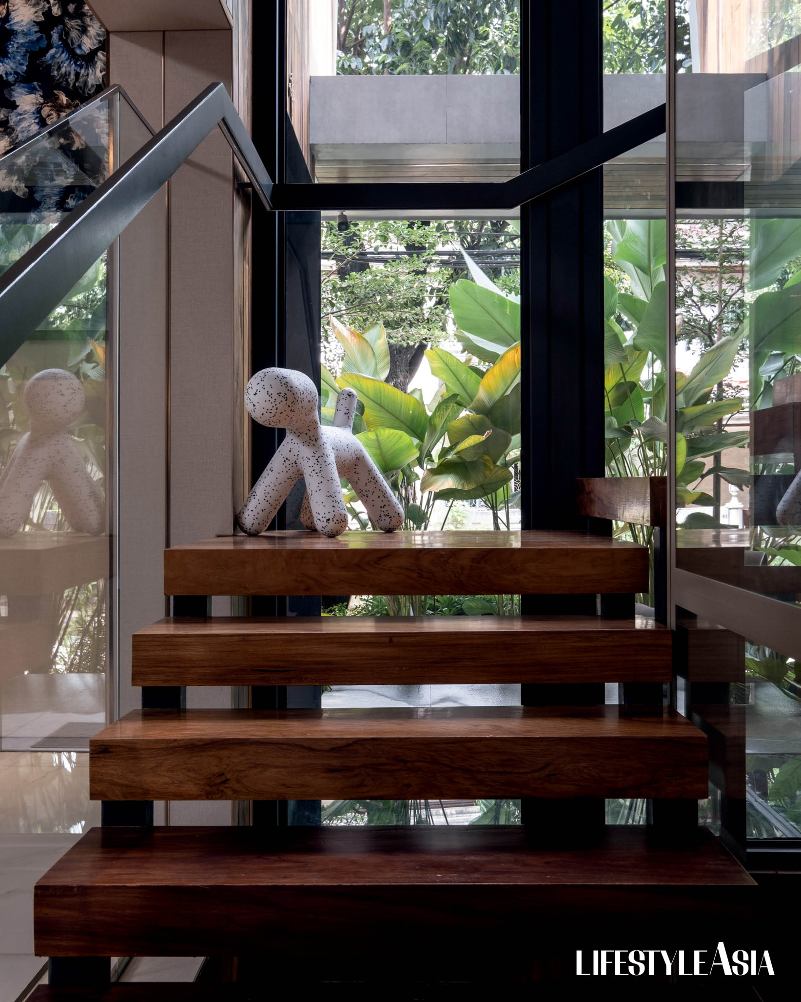 Eero Aarnio’s Puppy guards the stairs leading to the second floor