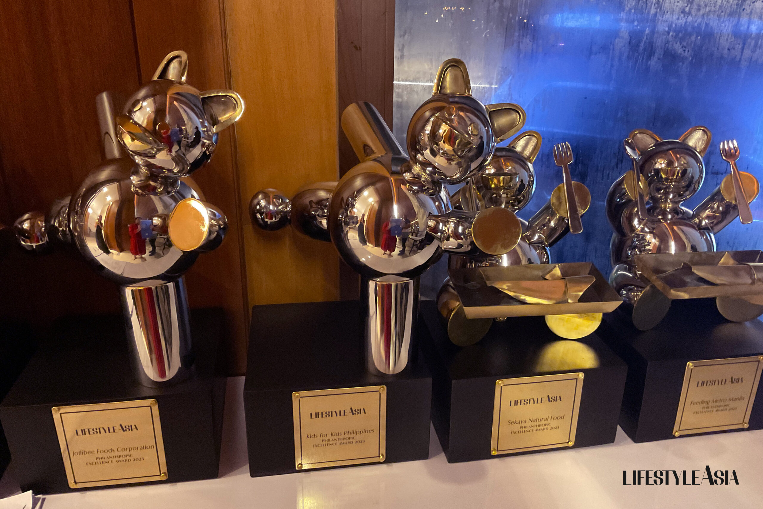 More Philanthropic Excellence Awards trophies, with the ones for the food category of the awards at the rightmost side
