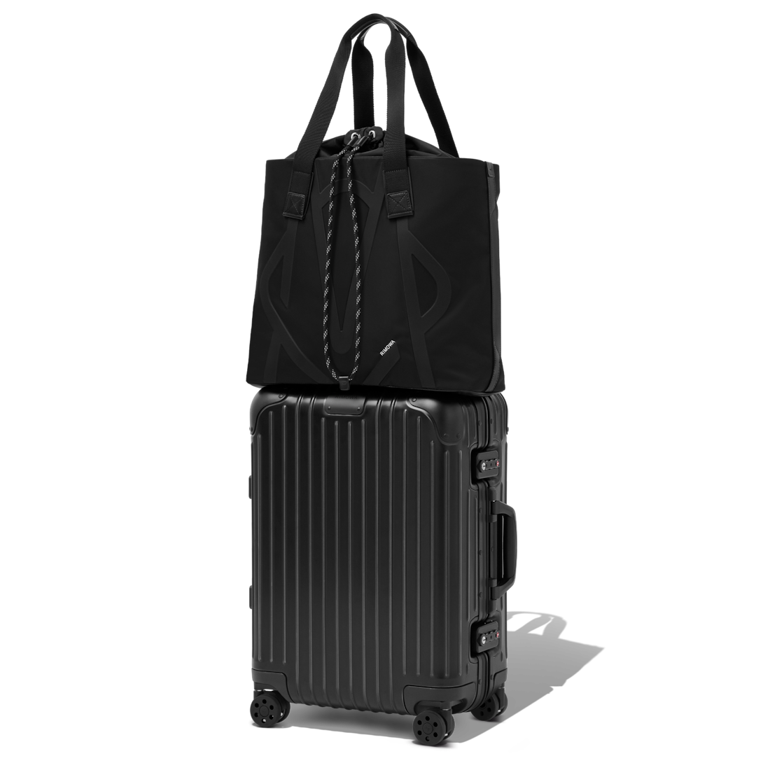 Rimowa's Sliding Tote can easily attach to larger suitcases during travel