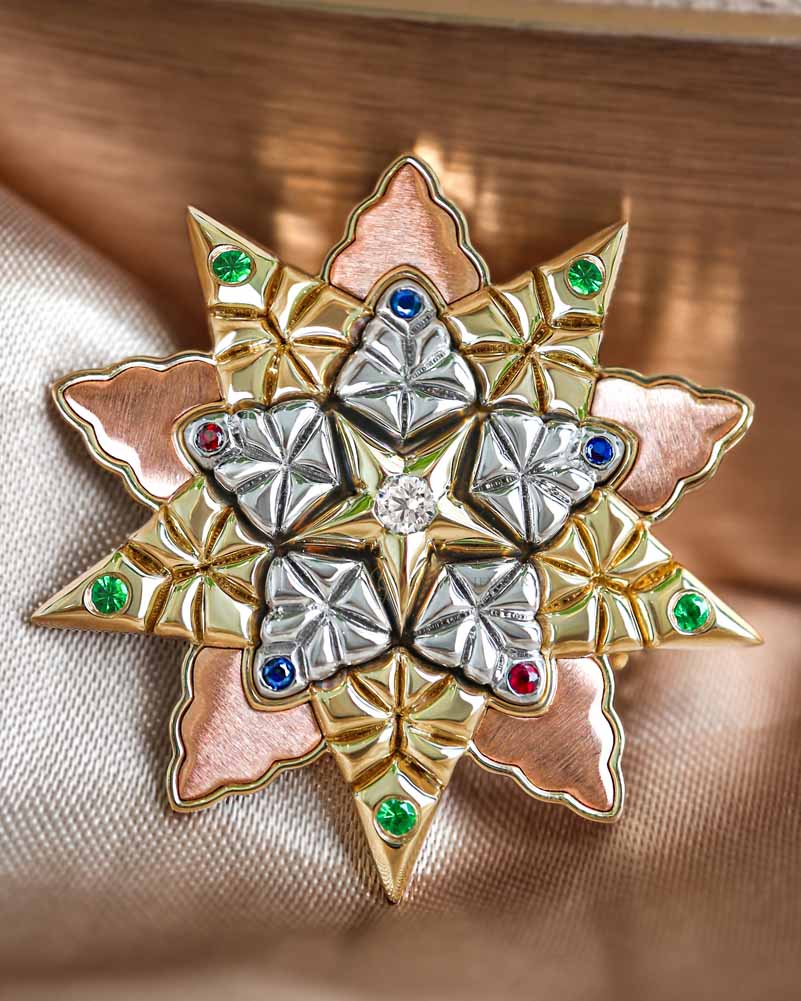 The Parol Brooch with emeralds, rubies, sapphires, and white diamonds