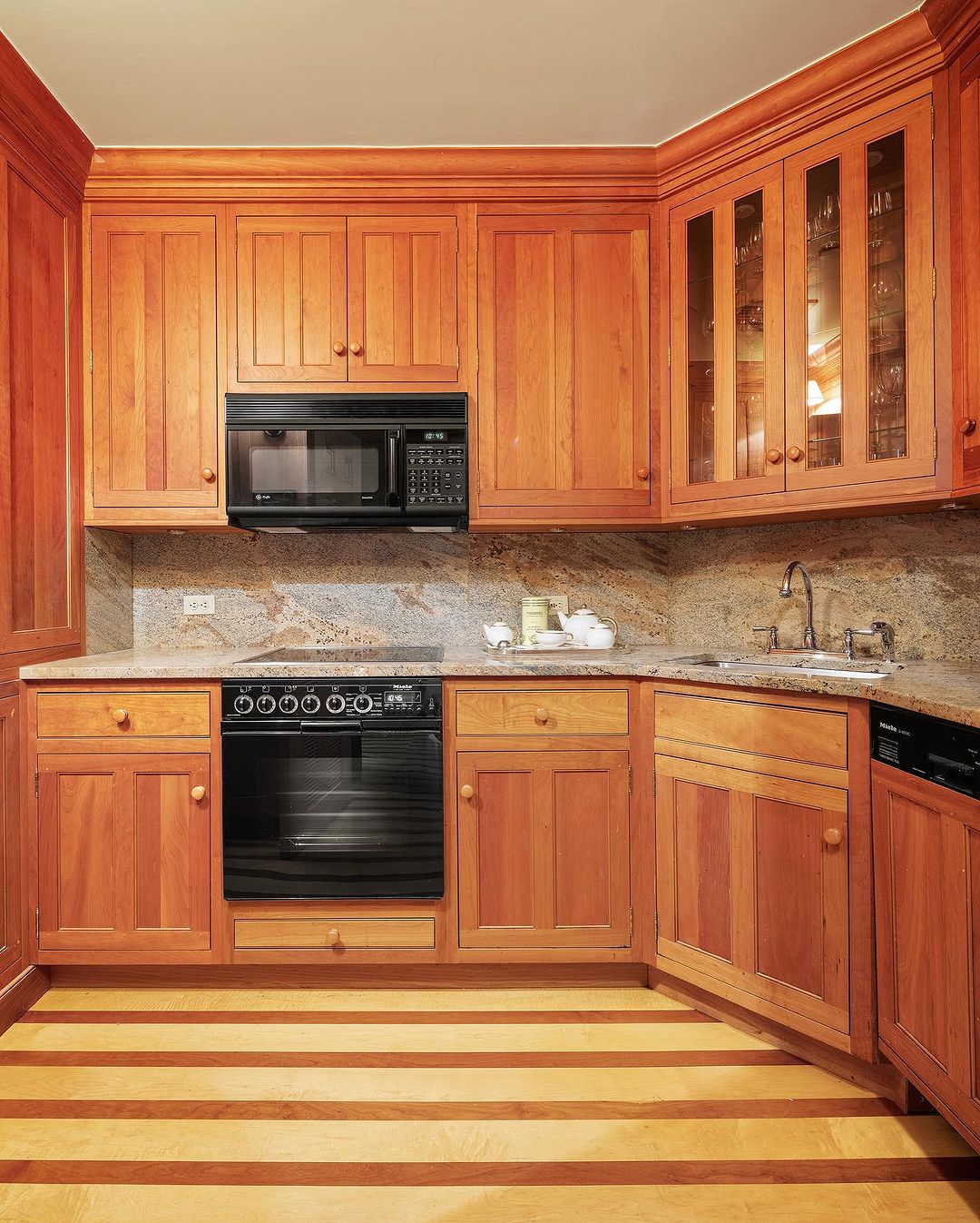 The kitchen is updated with modern appliances