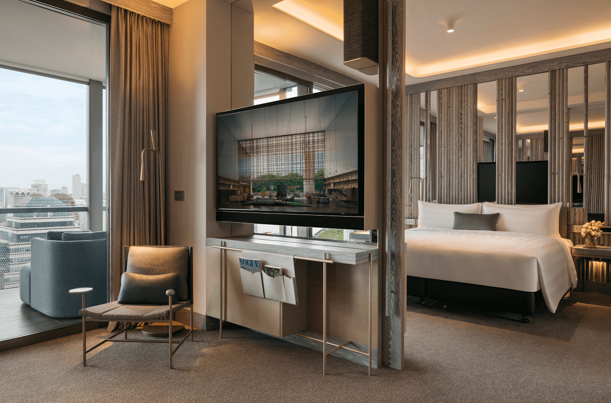 Their Cloud Terrace Suite showcases spectacular views of the city from the balcony, a separate living room, pantry, and a rainshower in the bathroom with a view.