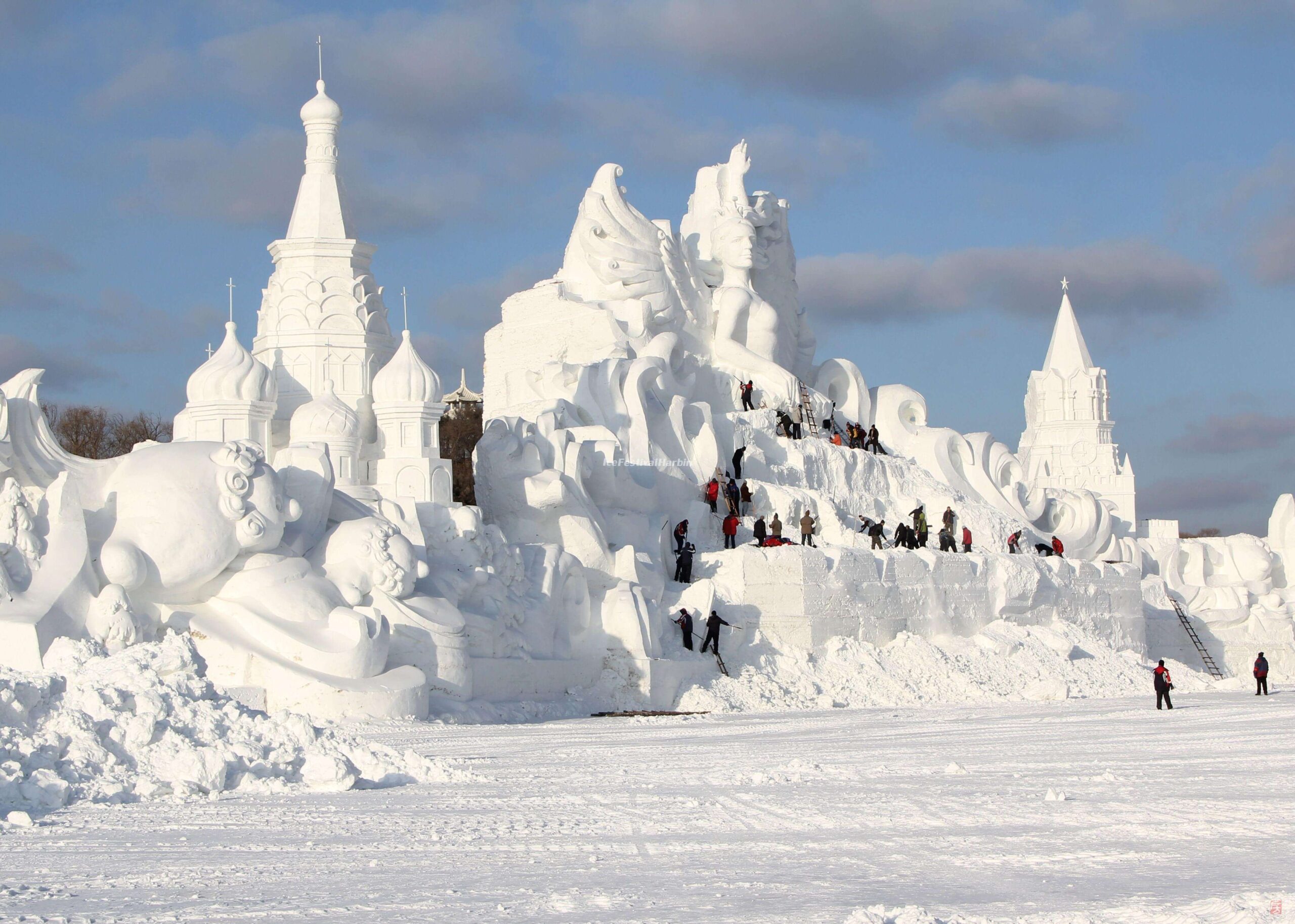 A grand snow sculpture in Harbin, China during the winter season