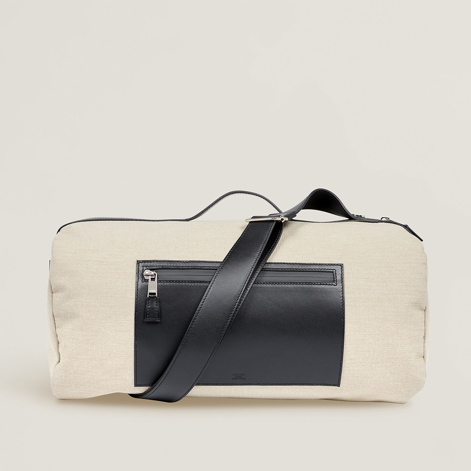 The Hermès Odyssee Terre Duffle Bag in "Ficelle/Noir"