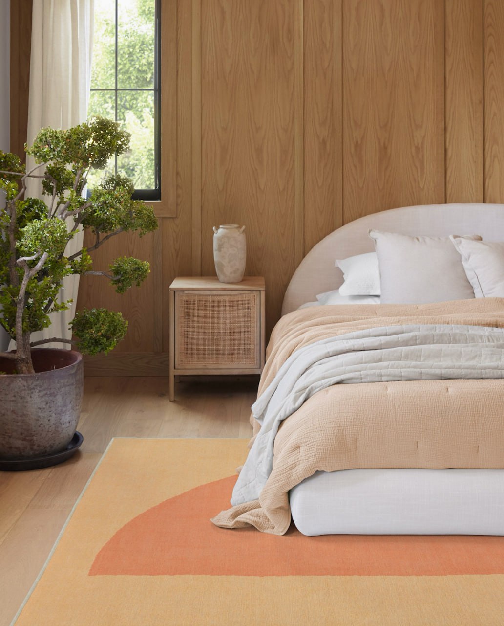 A peachy and welcoming bedroom concept from Ruggable