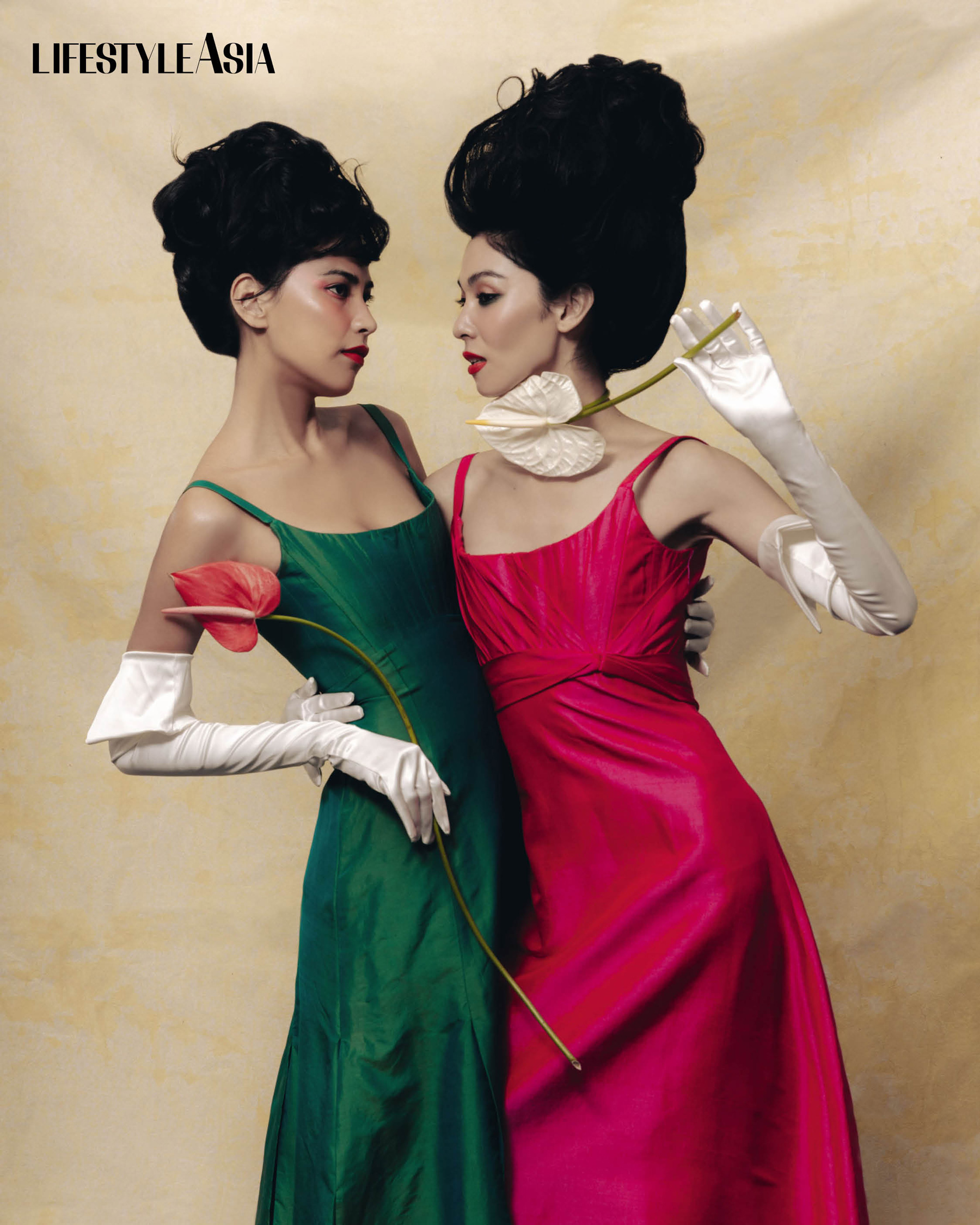 On Anna: Green square neck gown
On Taki: Magenta square-neck gown with empire-waist silhouette