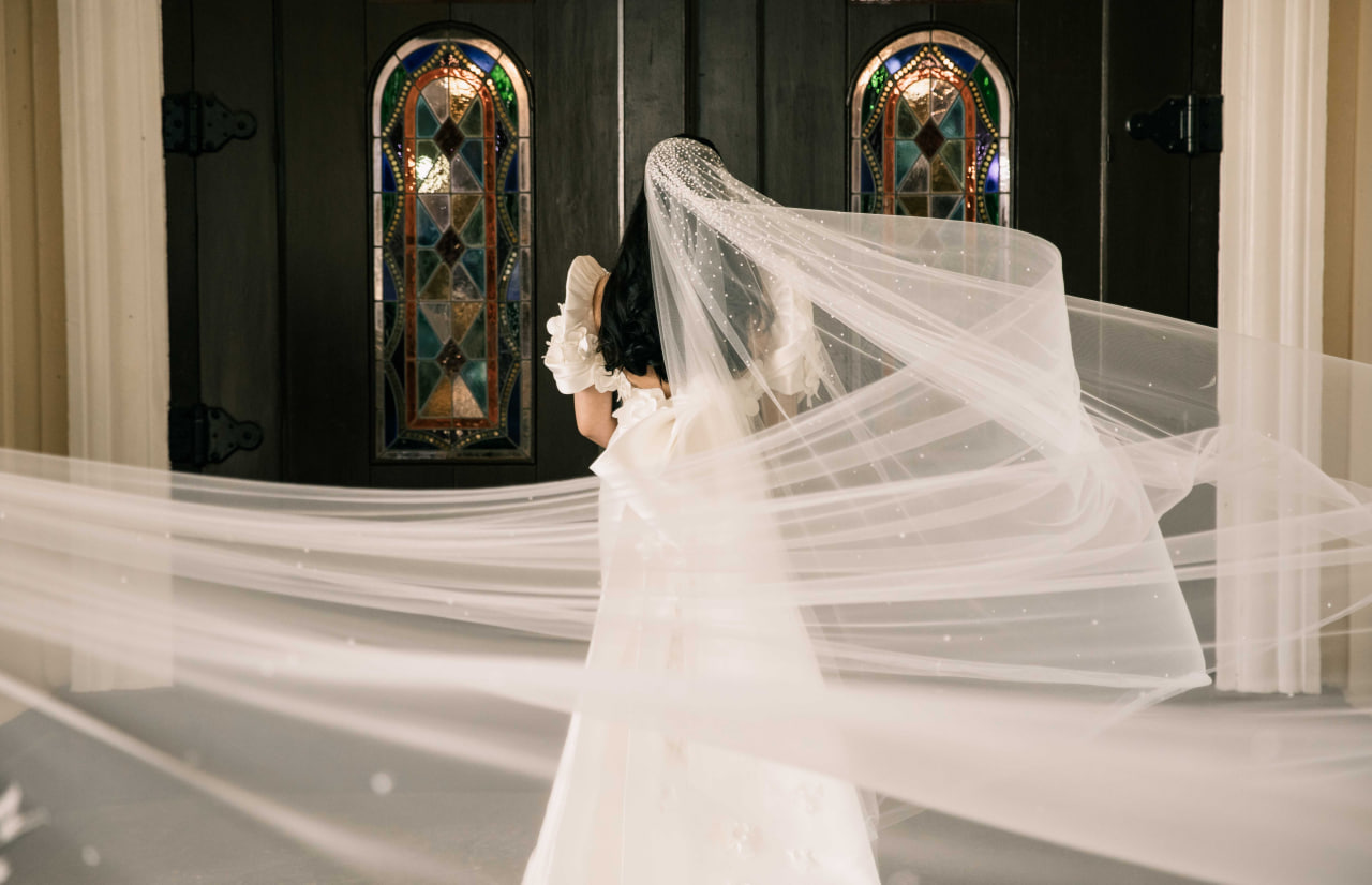 Justine Burgos gets ready to enter the church