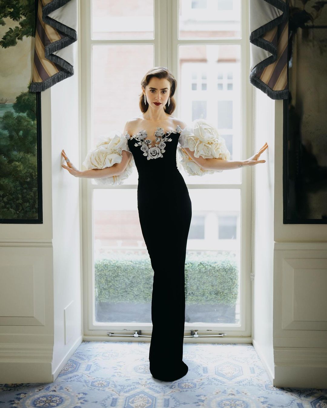 Lily J. Collins stuns in a Tamara Ralph dress and elegant Cartier earrings