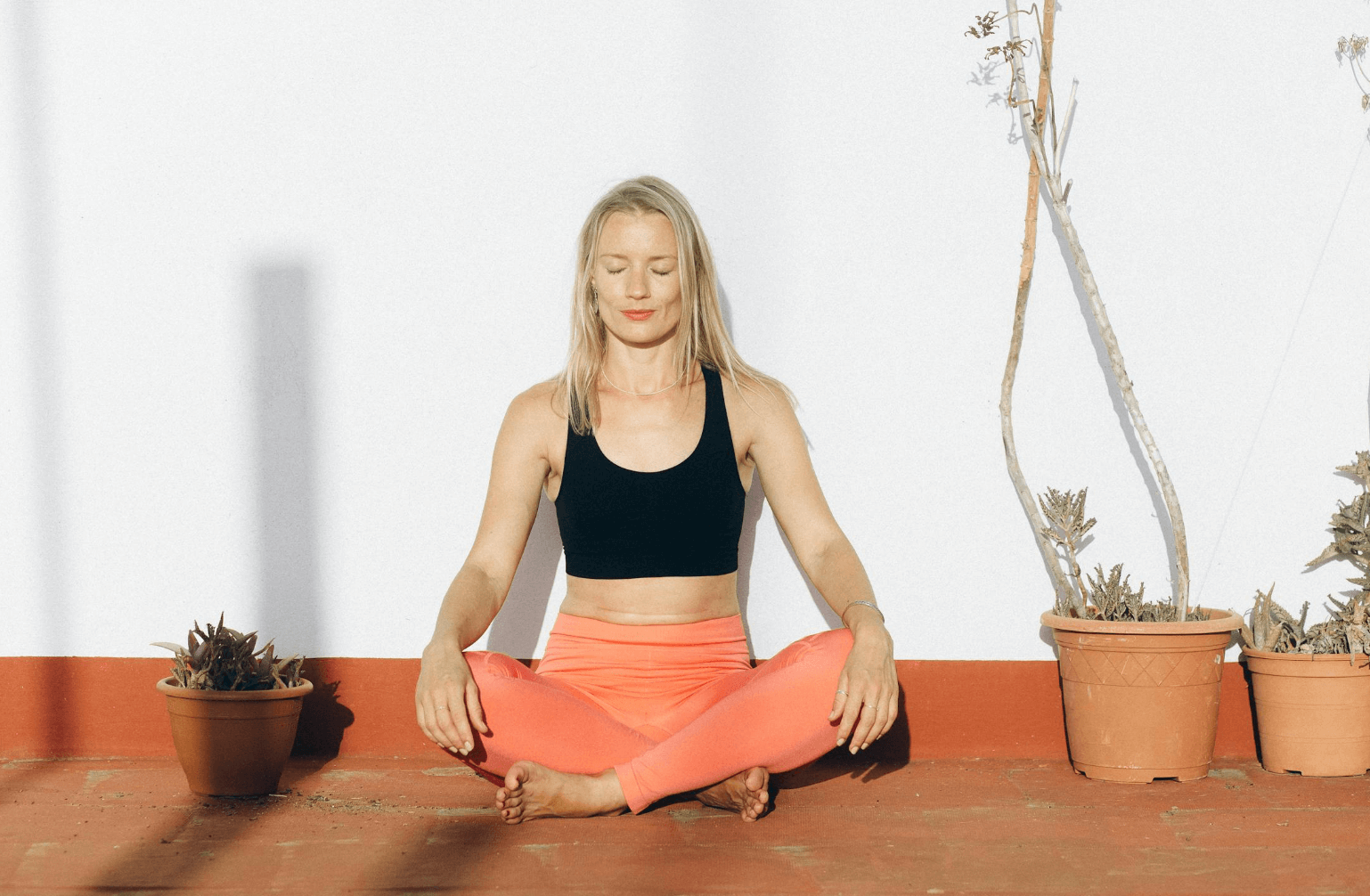 Happy lady reflecting on life, finding peace, forgiving herself.