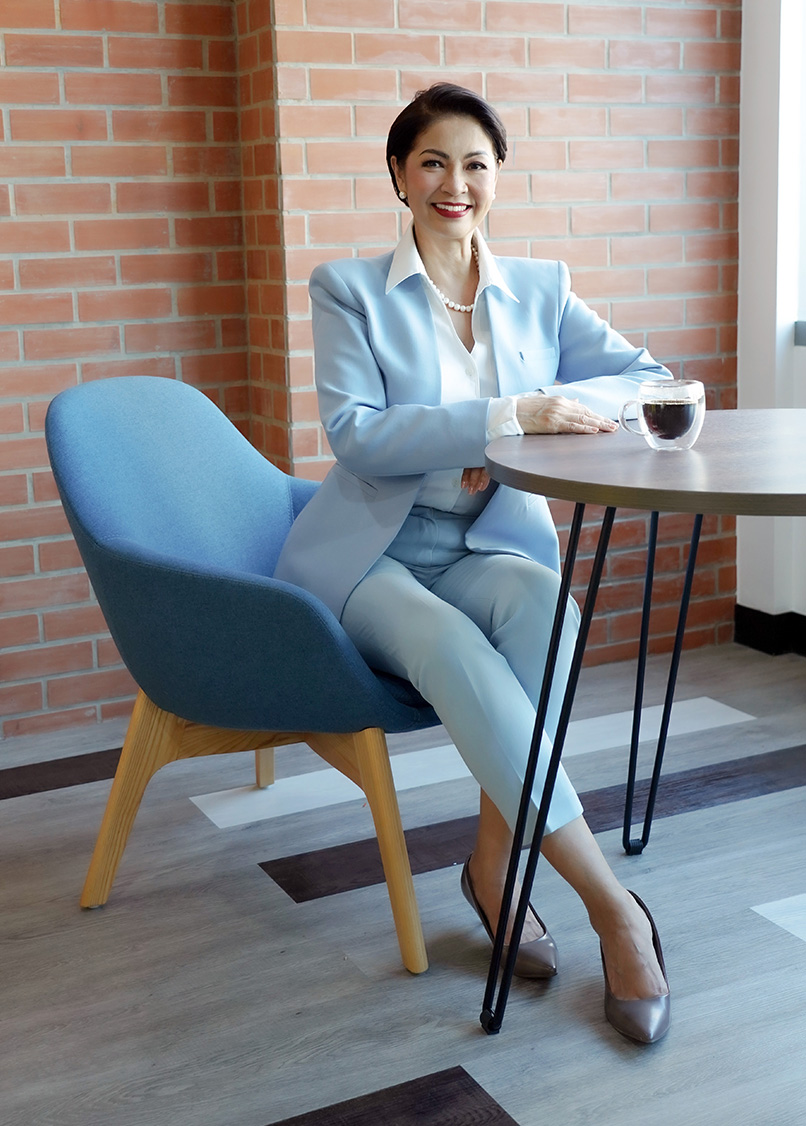 Eloisa Valenton in matching blue blazer and trousers