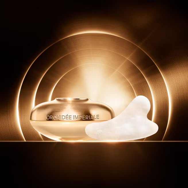 RIGHT: Guerlain's Orchidée Impériale Gold Nobile Serum; LEFT: Guerlain's Orchidée Impériale Gold Nobile Cream