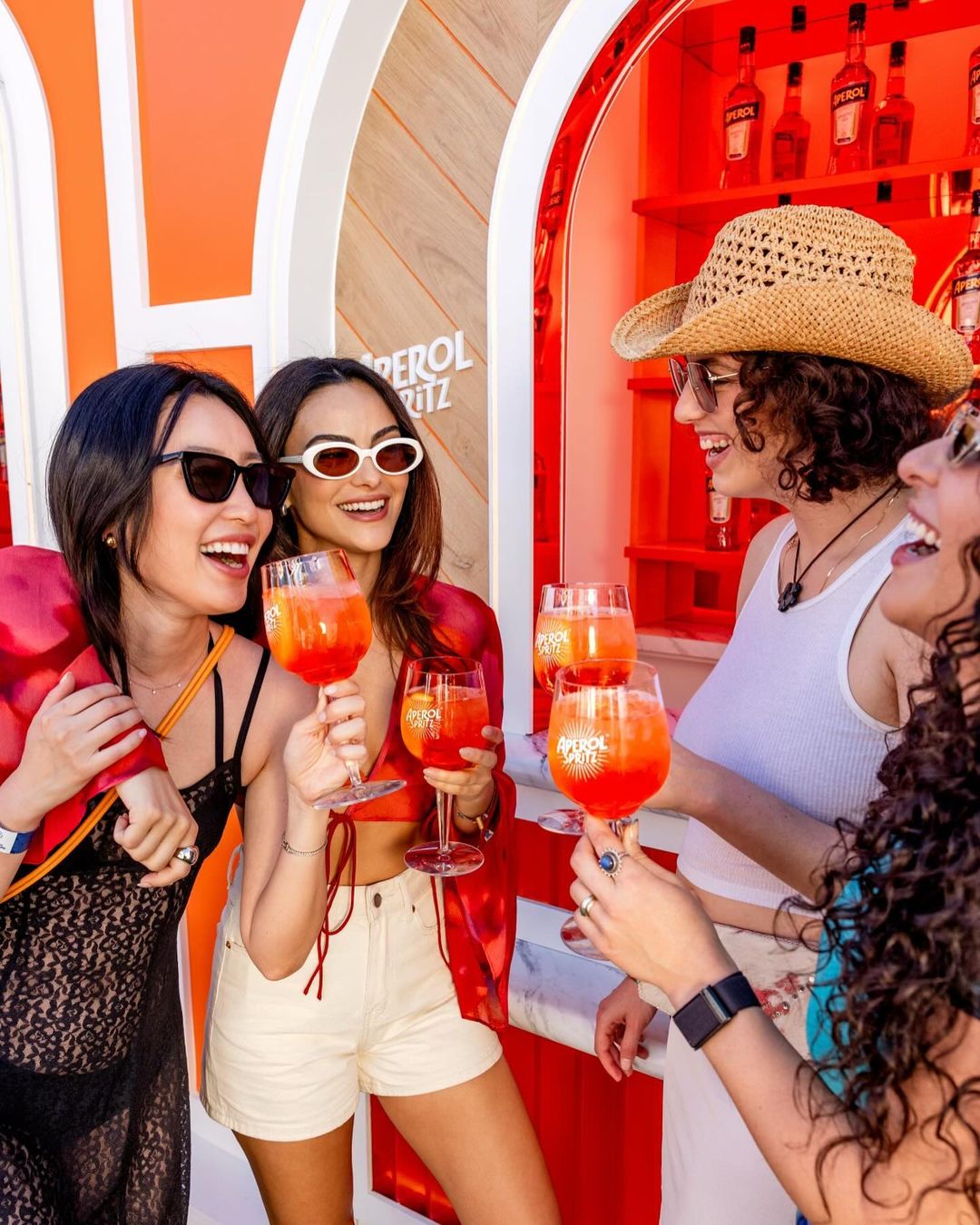 Camila Mendes, Olivia Sui, Paula Kroll, and Kiara Moreno with Aperol Spritz