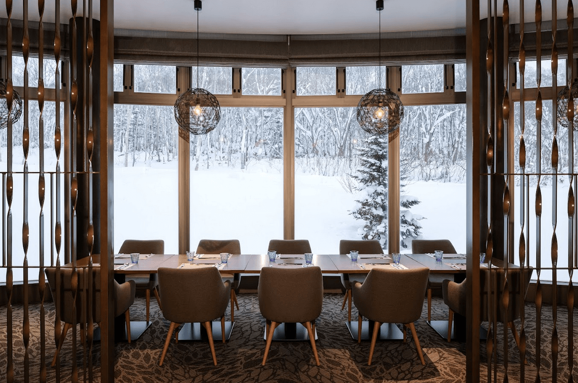 TOP LEFT:  Dining with a view; TOP RIGHT: A family tatami room; BOTTOM LEFT: Another room in Club Med Kiroro Grand; BOTTOM RIGHT: Rotenburo outdoor hot tub