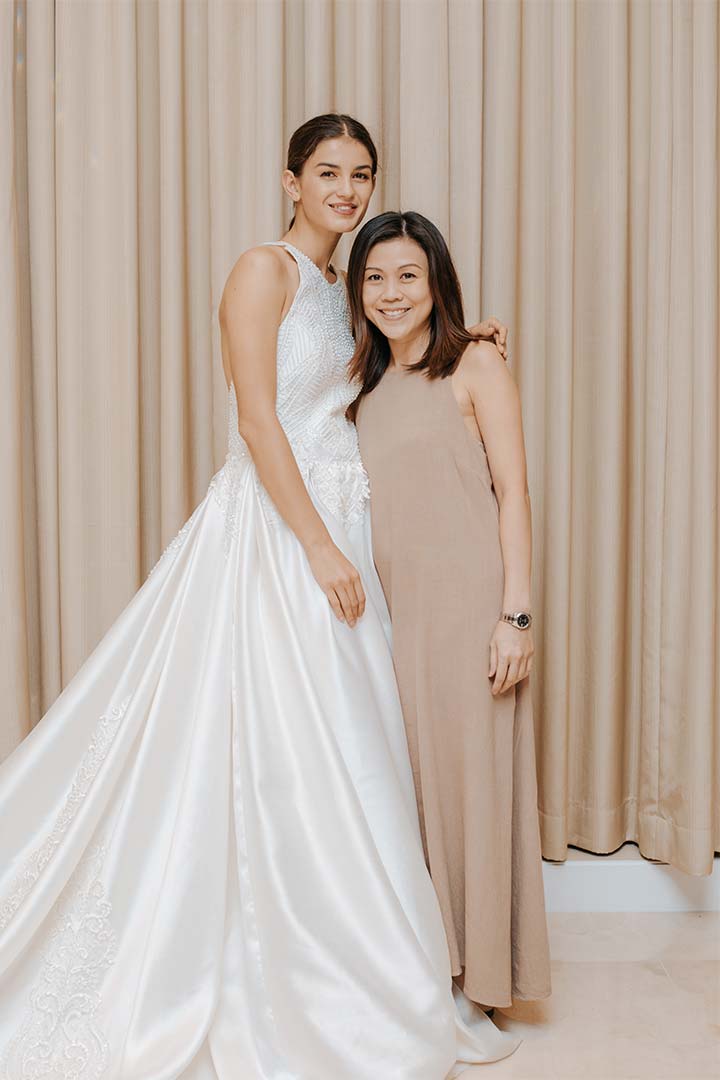 Debbie Co (right) shows one of her embroidered masterpieces