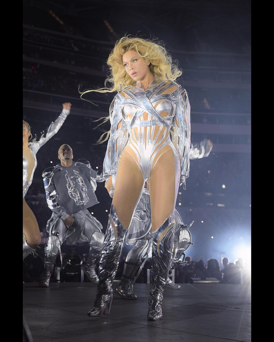 Mugler custom silver bodysuit and boots