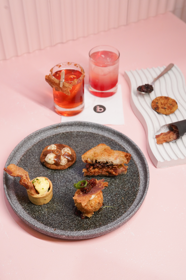 LEFT: The VIP tasting menu for Baken's multi-sensory experience; RIGHT: Pouring a shot of Bacon in a Glass