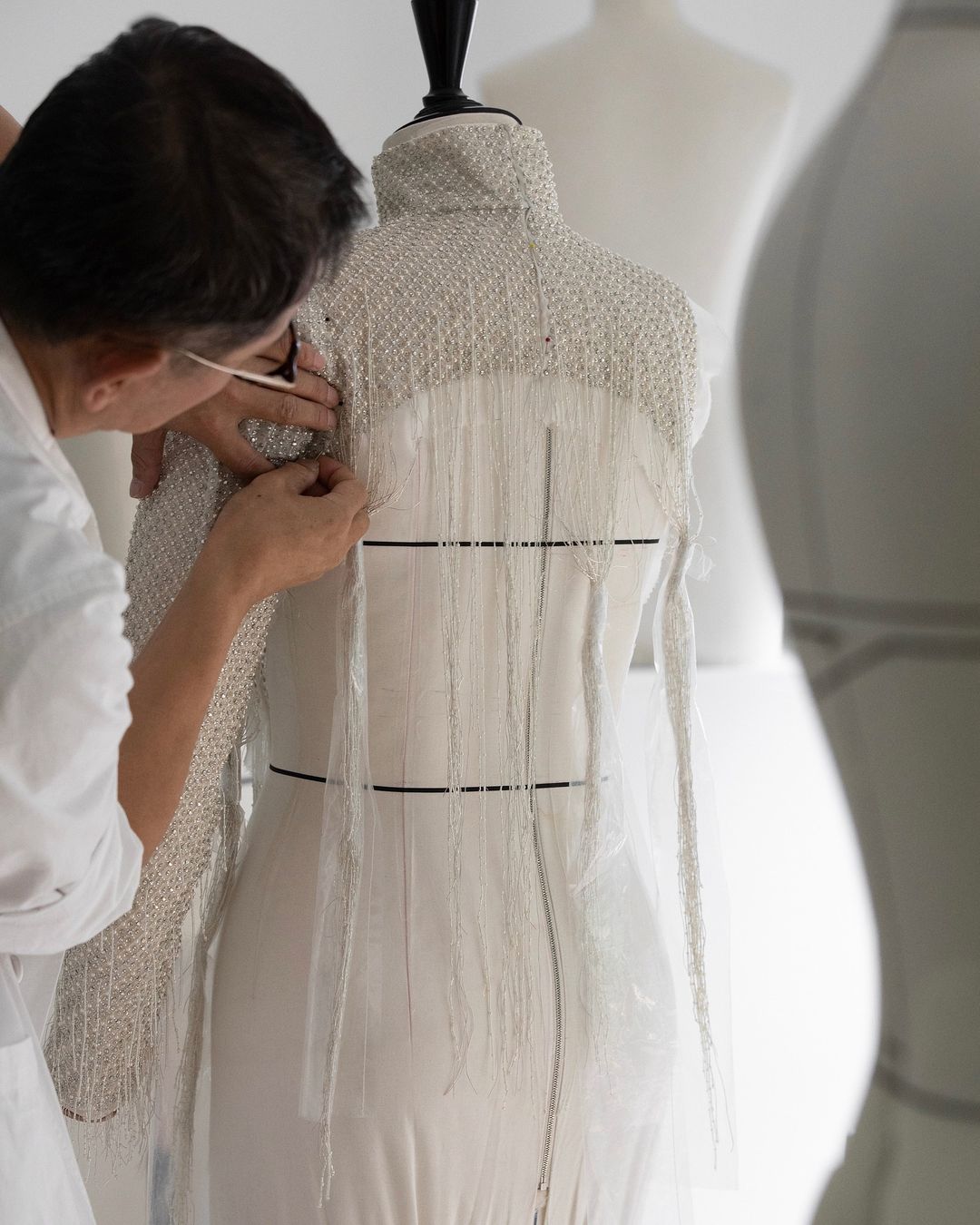 Dior behind the scenes in the making of Dion's Opening Ceremony dress