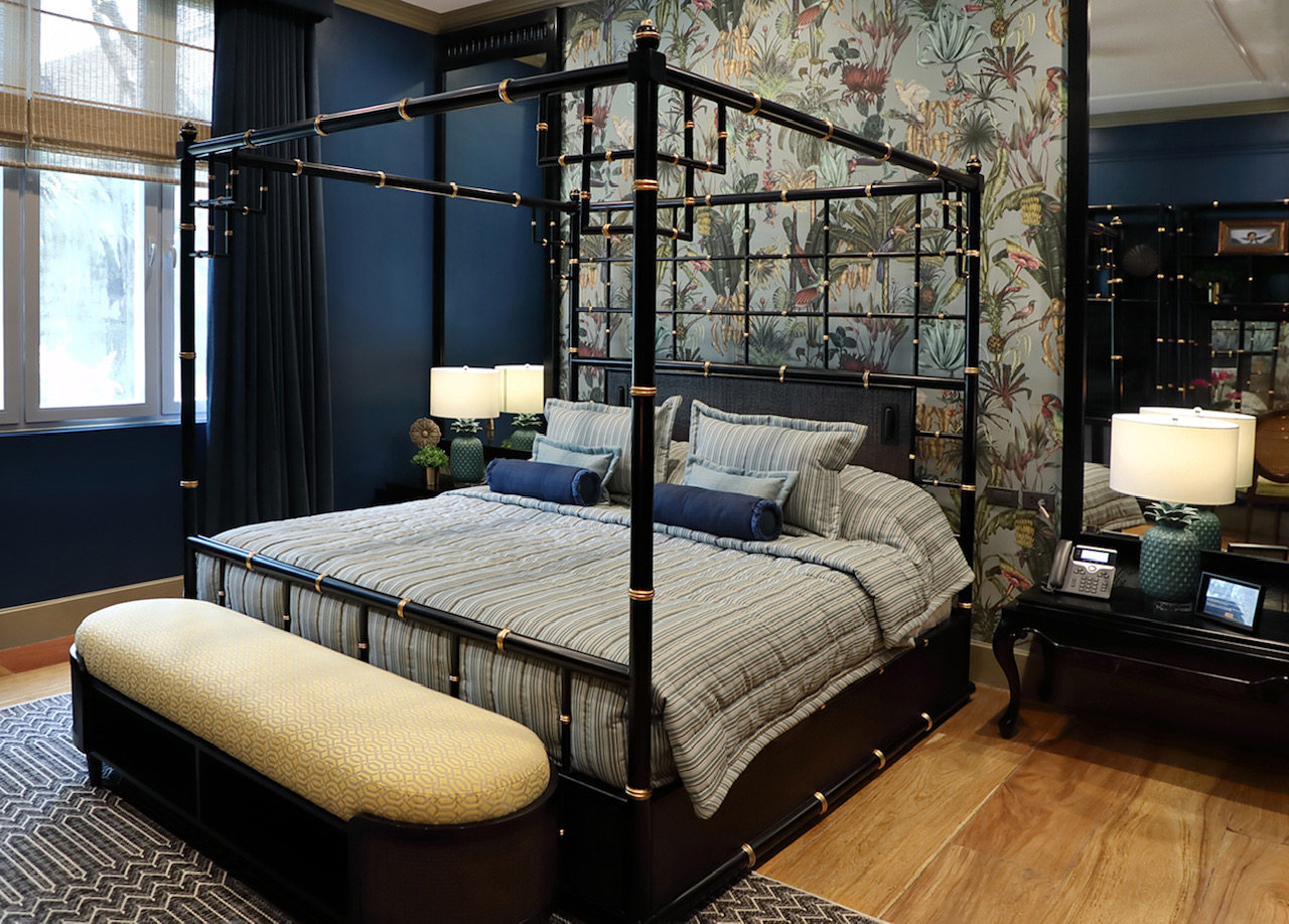 LEFT: The Gloria Macapagal-Arroyo Room at Laperal Mansion, Arlegui Guest House. RIGHT: A traditional-style dining room featuring a hand-painted wall by Tara Soriano that provides an idyllic backdrop for the vintage and custom made furniture.