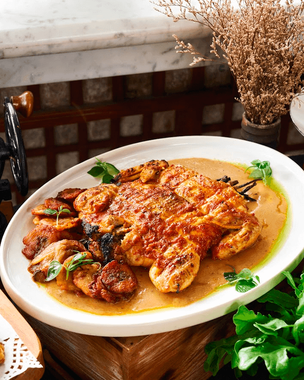TOP LEFT: Fresh Salad with Buratta, Figs, and Prosciutto. TOP RIGHT: Grilled Chicken. BOTTOM LEFT: Dessert Tower Merienda. BOTTOM RIGHT: Caldereta.