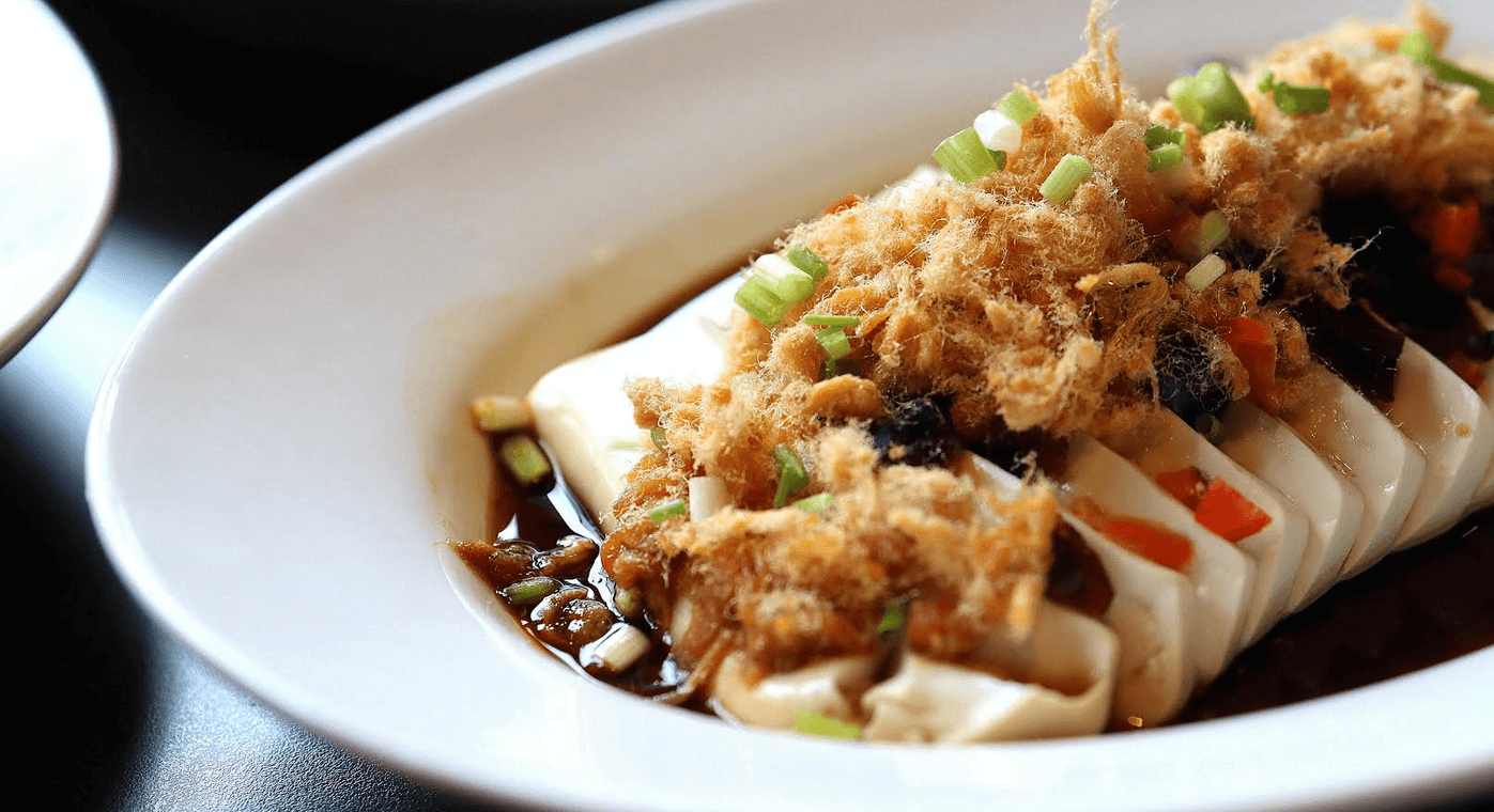 LEFT: Braised Vegetarian Mushrooms, Bean Curd Skin. RIGHT: Tofu with Century Egg and Meat Floss.