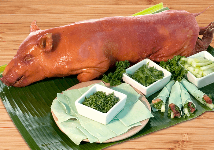 TOP LEFT: Mesa's award-winning Crispchon. TOP RIGHT: Pomelo Salad. BOTTOM LEFT: Laing 2 Ways. BOTTOM RIGHT: Tinapa Rice.