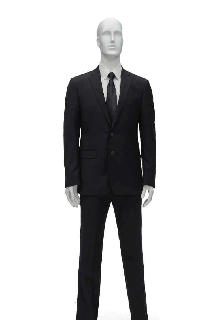 JFK Jr.’s Calvin Klein suit and black tie