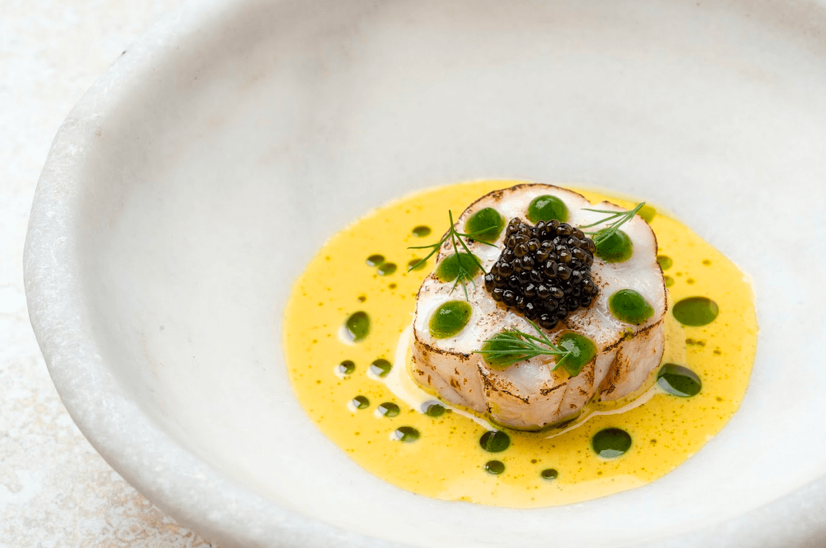 LEFT: Grouper. RIGHT: Cumin Peas.