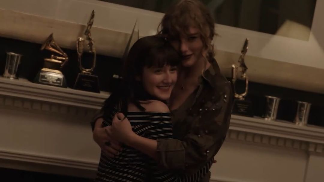 During Taylor Swift's listening session with fans at holiday house