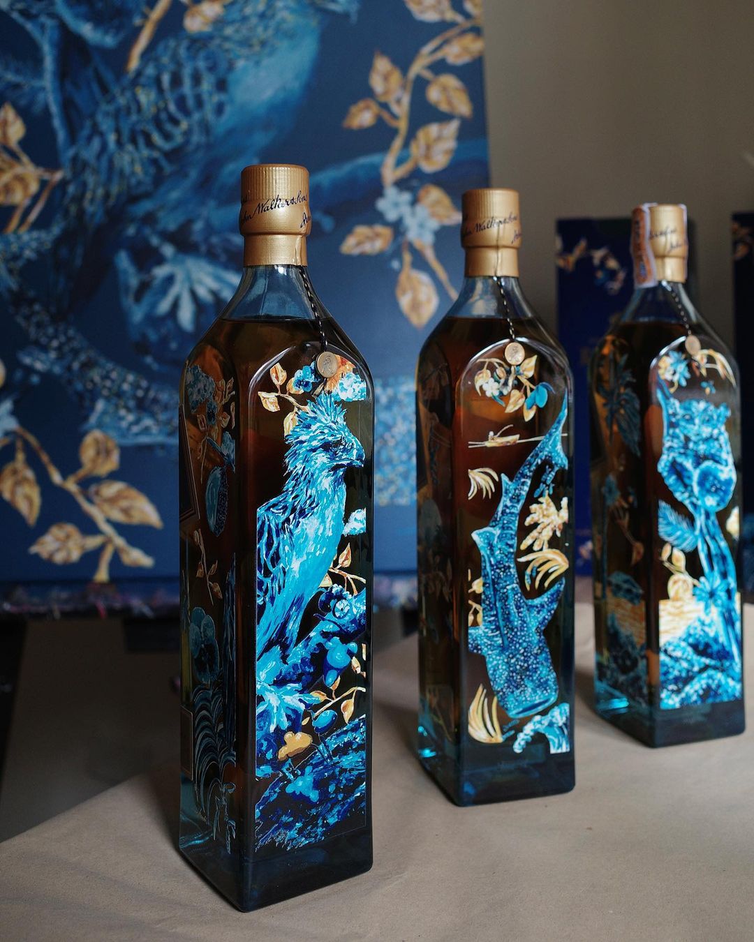 The original artworks by Anna Bautista for the Johnnie Walker Blue Label Luxury Artist Series