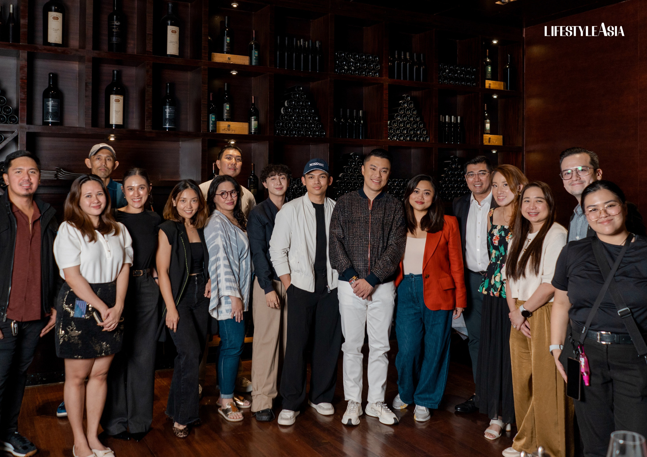 Kevin Tan and Candy Dizon with the team behind the December 2024 Alpha cover shoot