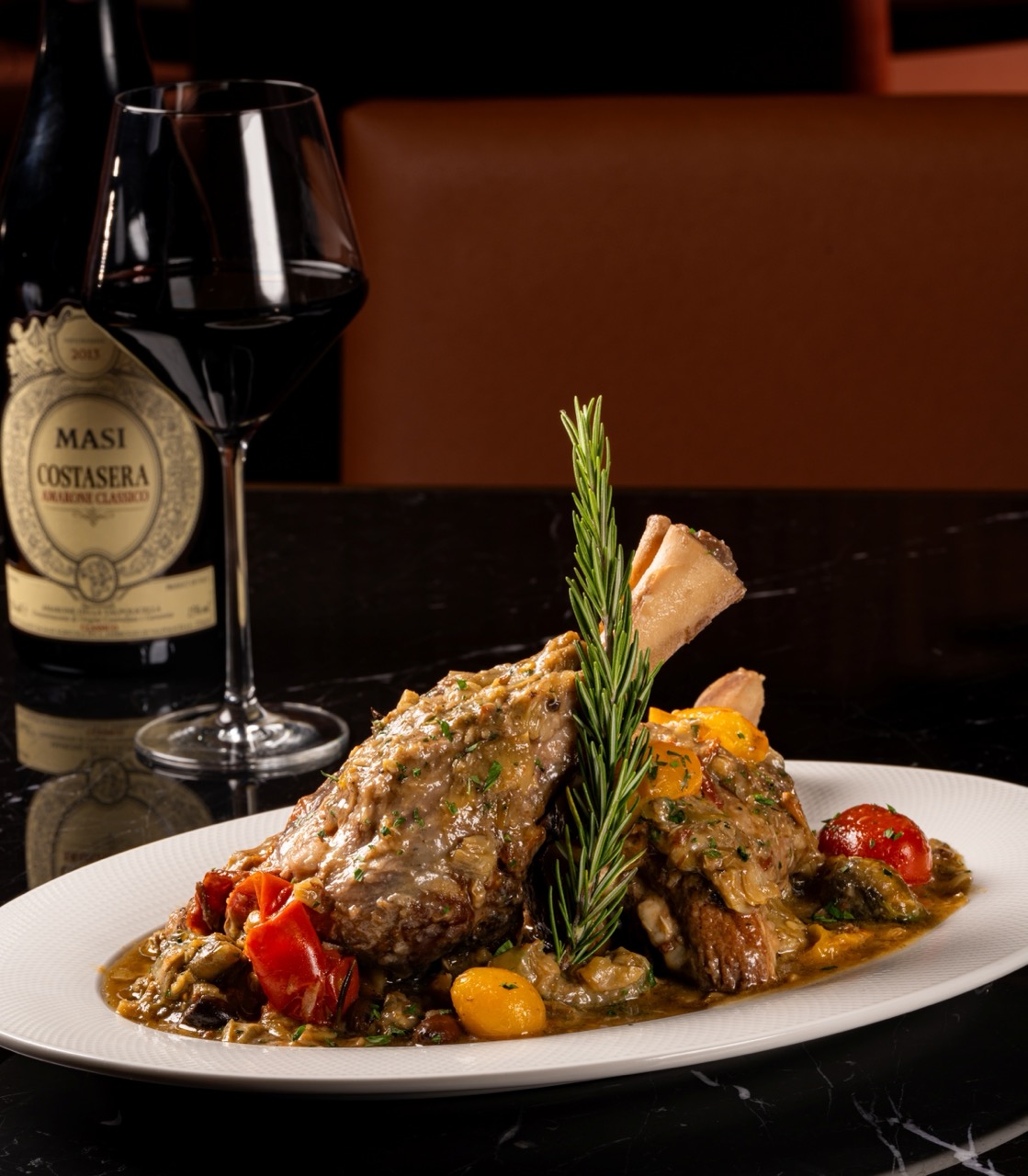 Sinco di Agnello ai Carciofi; Calameretti all' Astice; Costata Di Manzo; and Insalata Di Burrata E Pomodoro