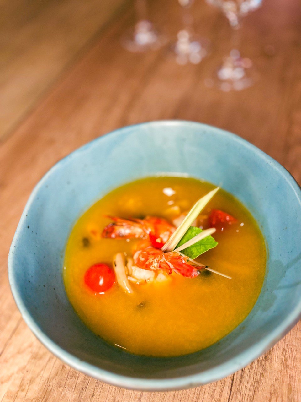 Tom Yam Goong, a hot sour prawn soup with aromatic herbs 