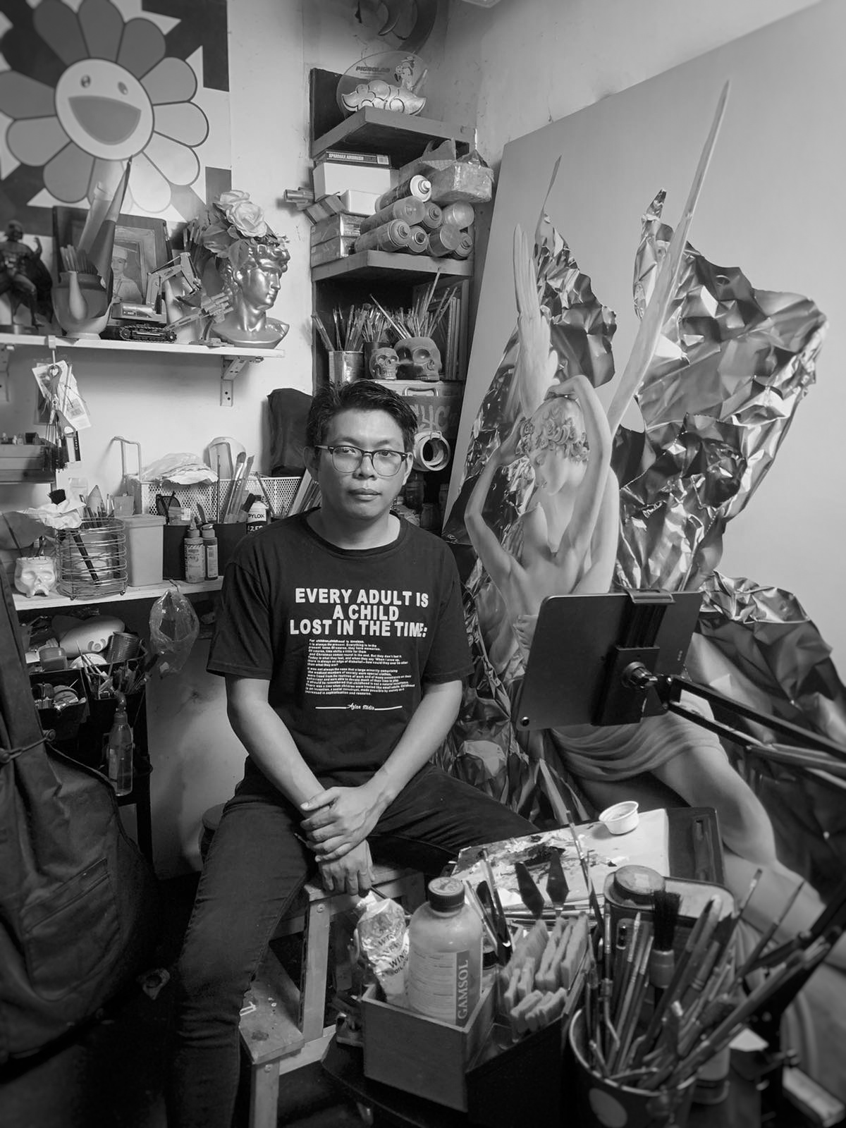 JM Saycon in his workspace