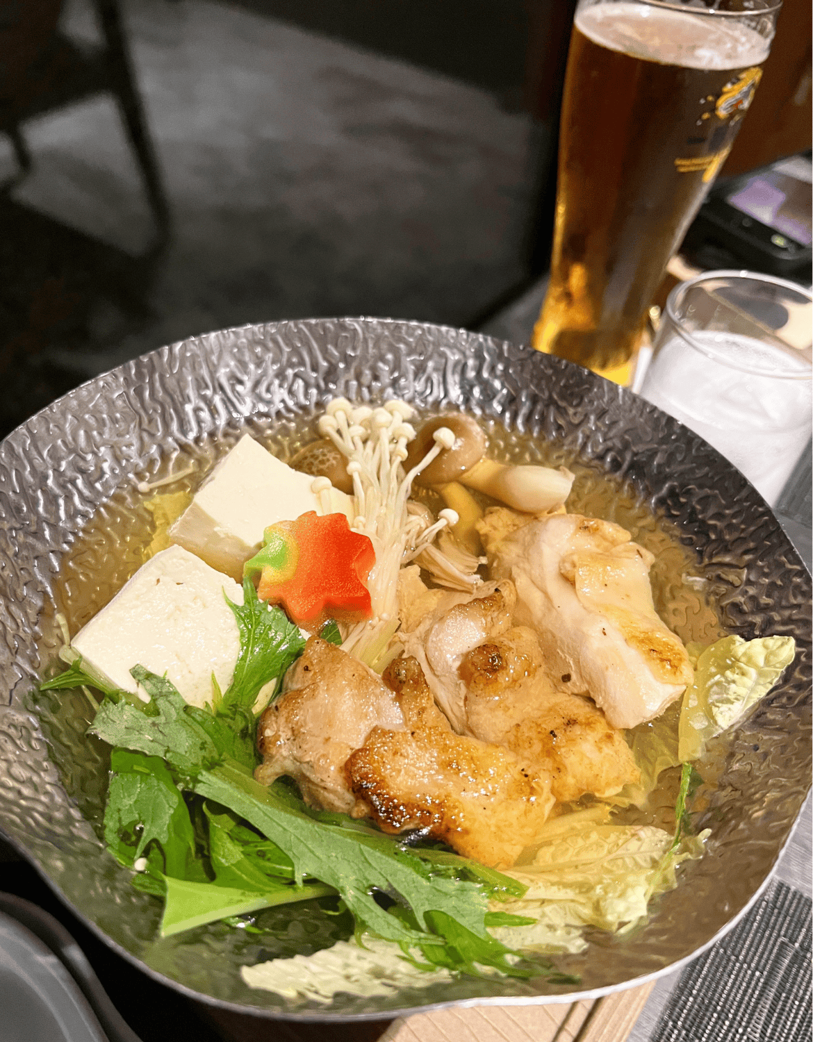 A Dainomono dish of grilled chicken, tofu, mushroom and vegetables at the Hakujukan dinner in Fukui Japan 