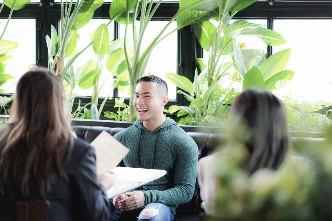Jaime joyfully sharing family favorites and anecdotes from his childhood and their family trips, which eventually influenced how the standard and creativity of the Wildflour Hospitality Group