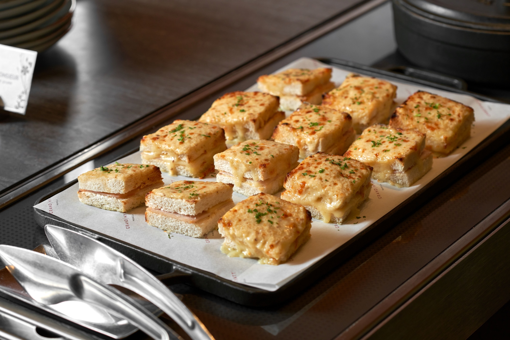 Croque monsieur with ham, mustard, bechamel, and gruyere