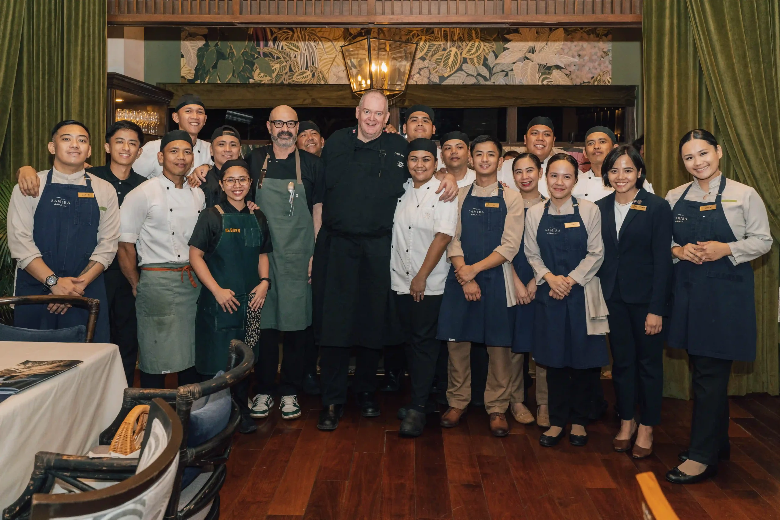 El Born's Chef David Amoros, Anya Executive Chef Chris Leaning, and the entire four-hands dinner team celebrate with a picture after a successful service