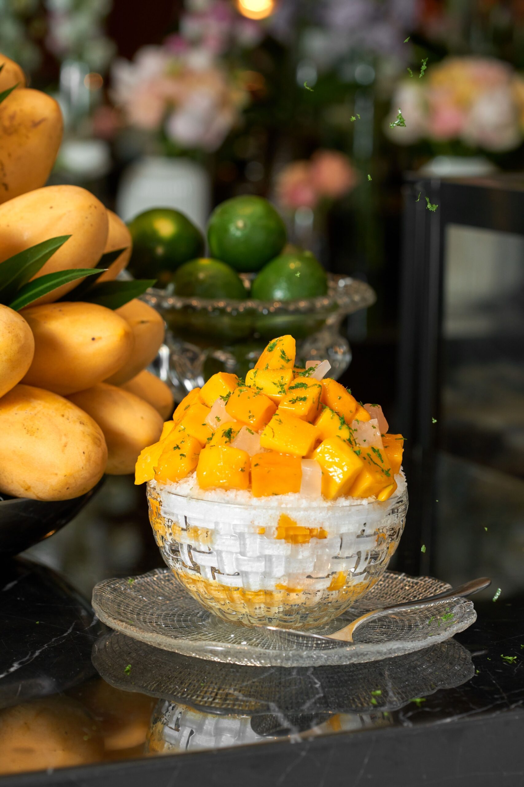 Homemade Mango Bingsu with shaved ice, condensed milk, fresh mango, and coconut ice cream